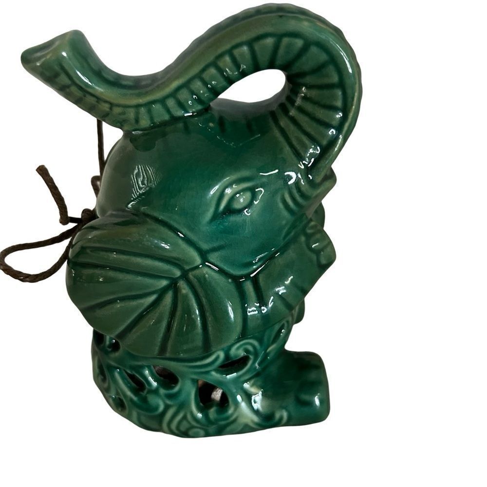 Adorable jade green ceramic Elephant potpourri holder.